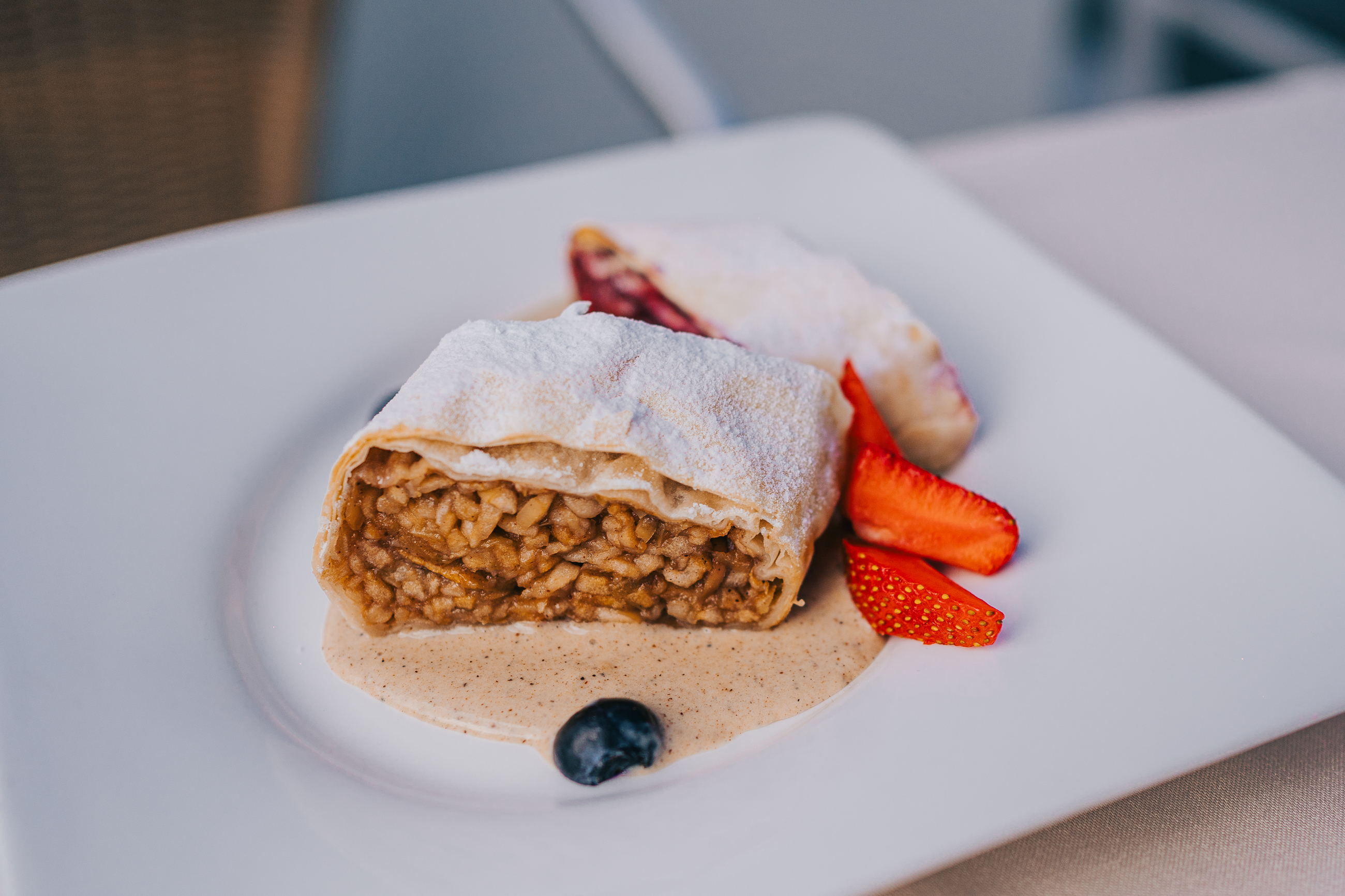Apple strudel dessert with strawberries